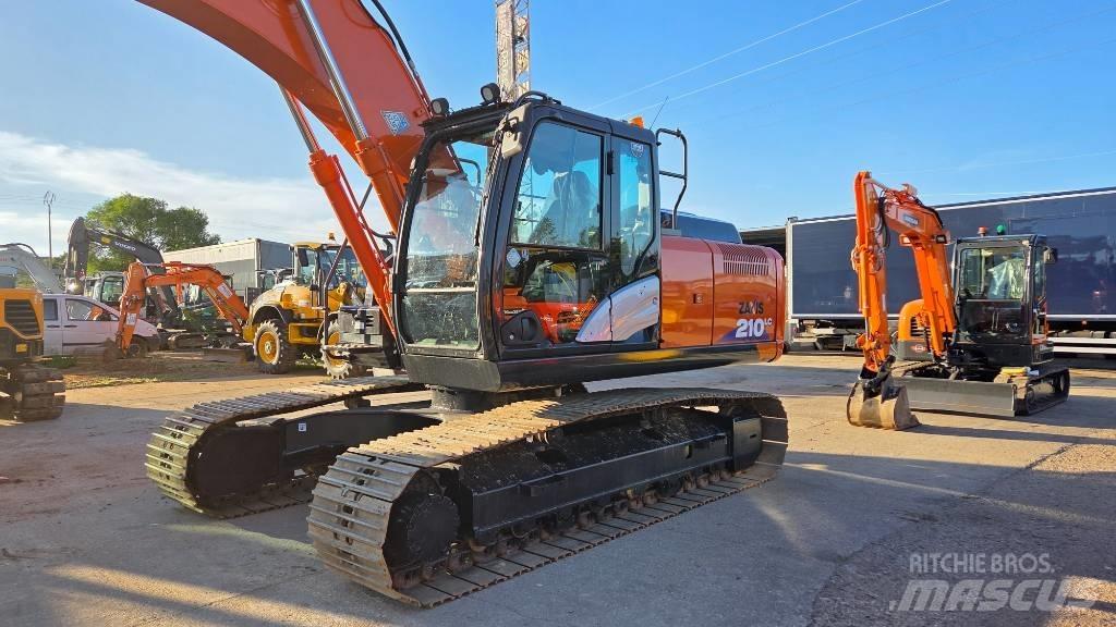 Hitachi ZX 210 Гусеничные экскаваторы