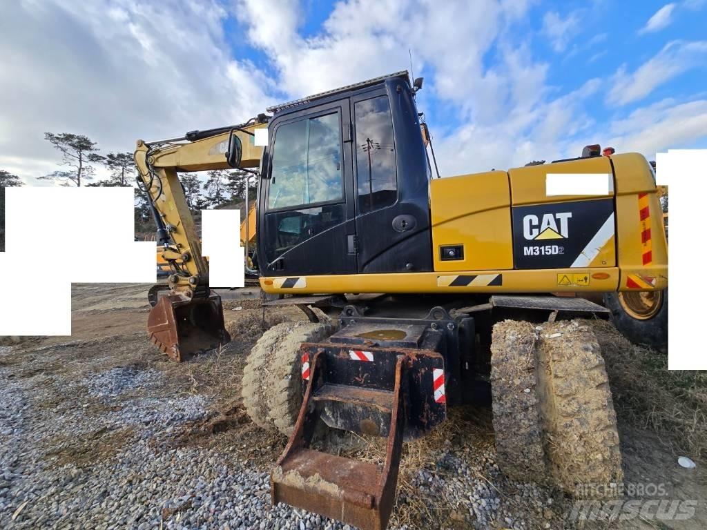 CAT M 315 D Колёсные экскаваторы