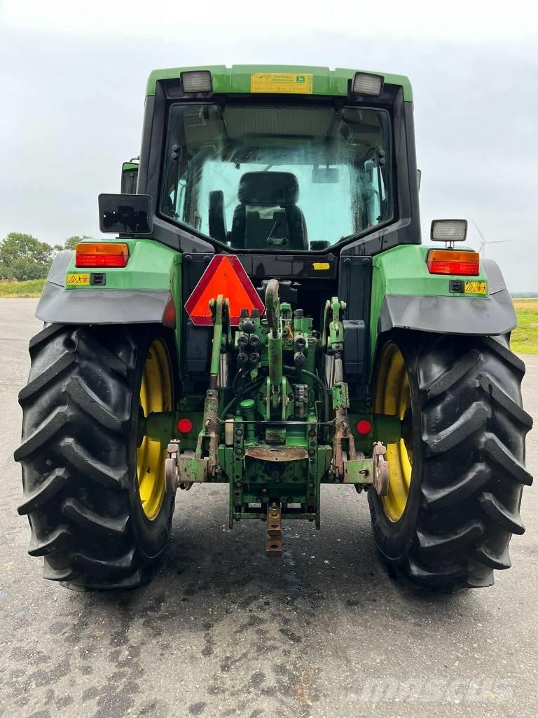 John Deere 6400 Трактора