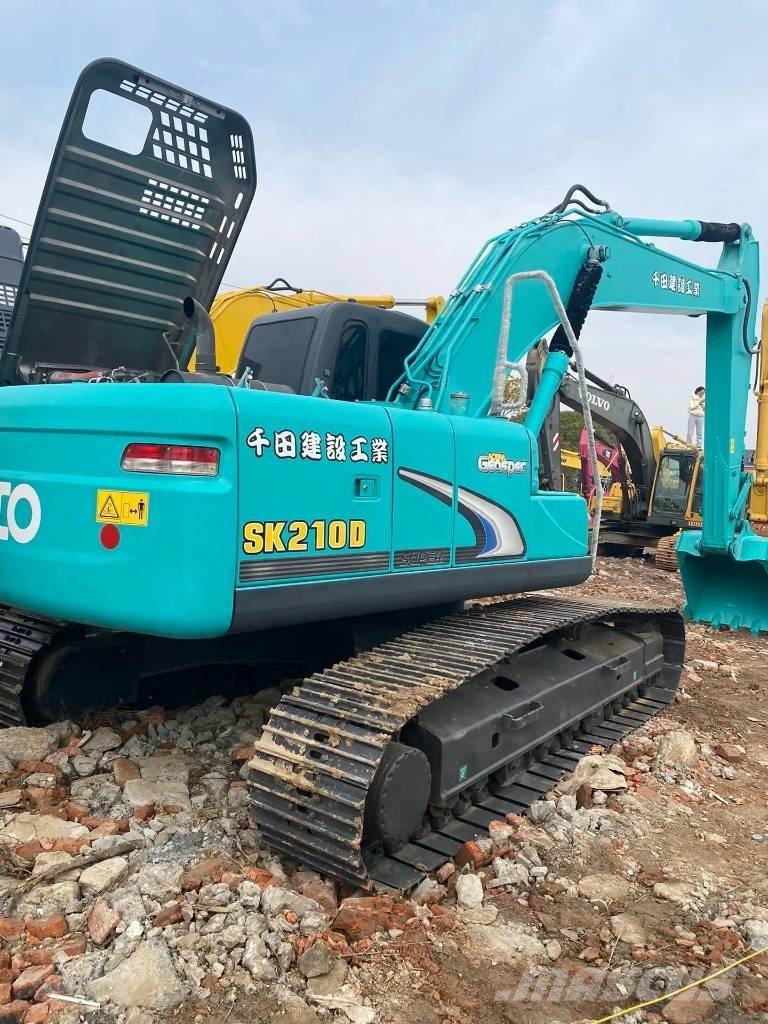 Kobelco 210 Гусеничные экскаваторы