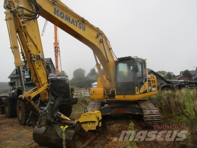 Komatsu HR 215 Гусеничные экскаваторы