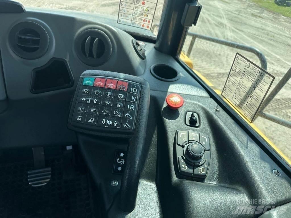Bell B40E Шарнирно-сочленённые самосвалы