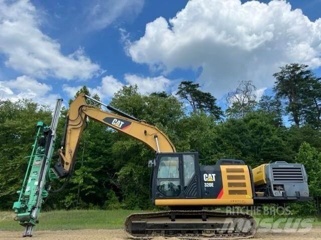 CAT 320EL Буровые вышки