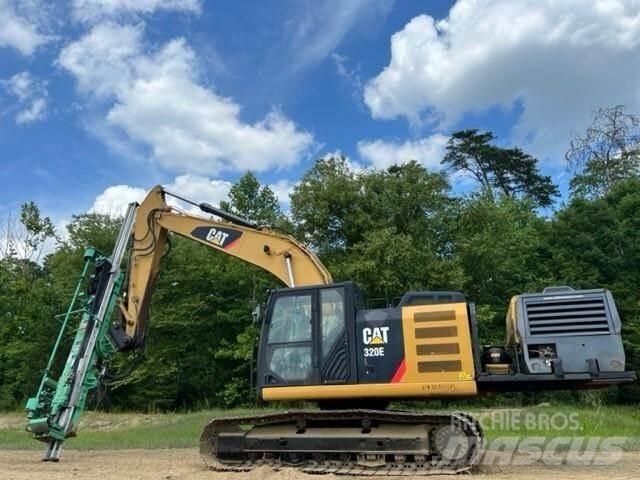 CAT 320EL Буровые вышки
