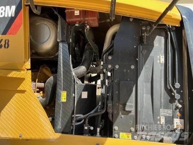 CAT 938M Фронтальные погрузчики