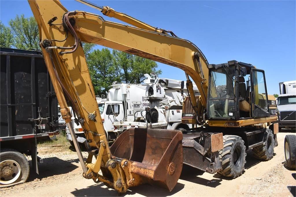 CAT M318 Колёсные экскаваторы