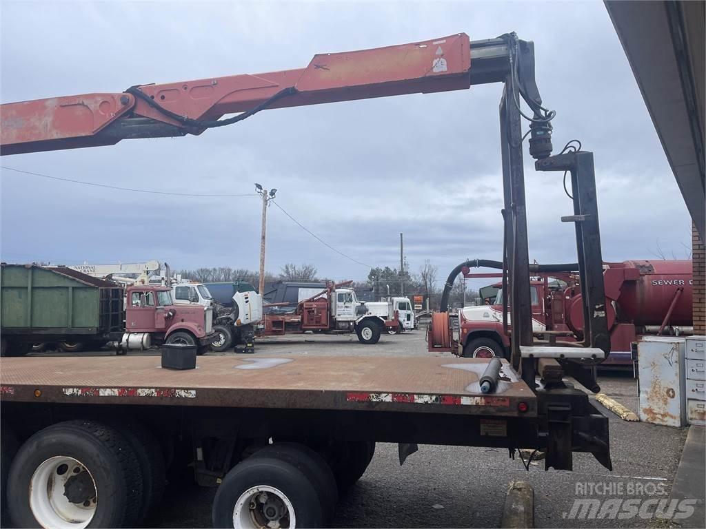 Fassi F230SE Лесопогрузчик