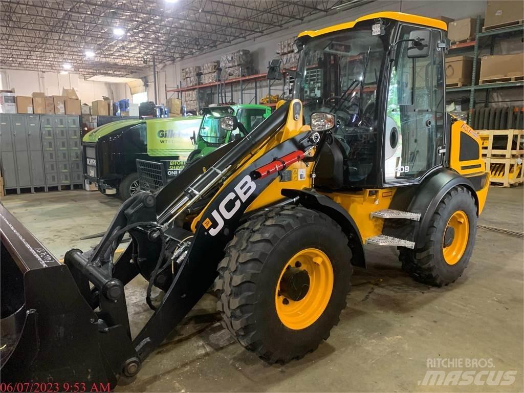 JCB 409 Фронтальные погрузчики