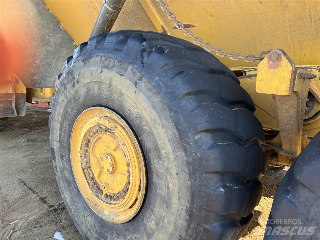 John Deere 460E Шарнирно-сочленённые самосвалы