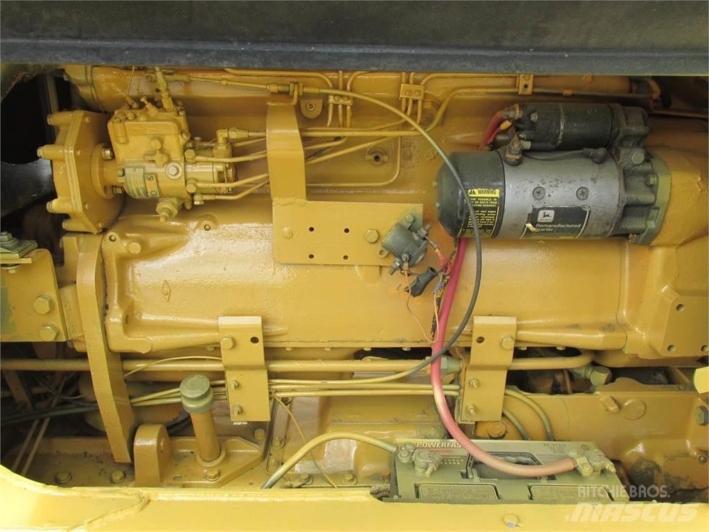 John Deere 570 Грейдеры