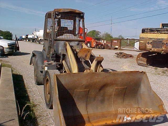 Komatsu WA100 Фронтальные погрузчики