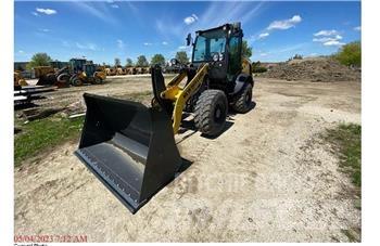 New Holland W80C Фронтальные погрузчики