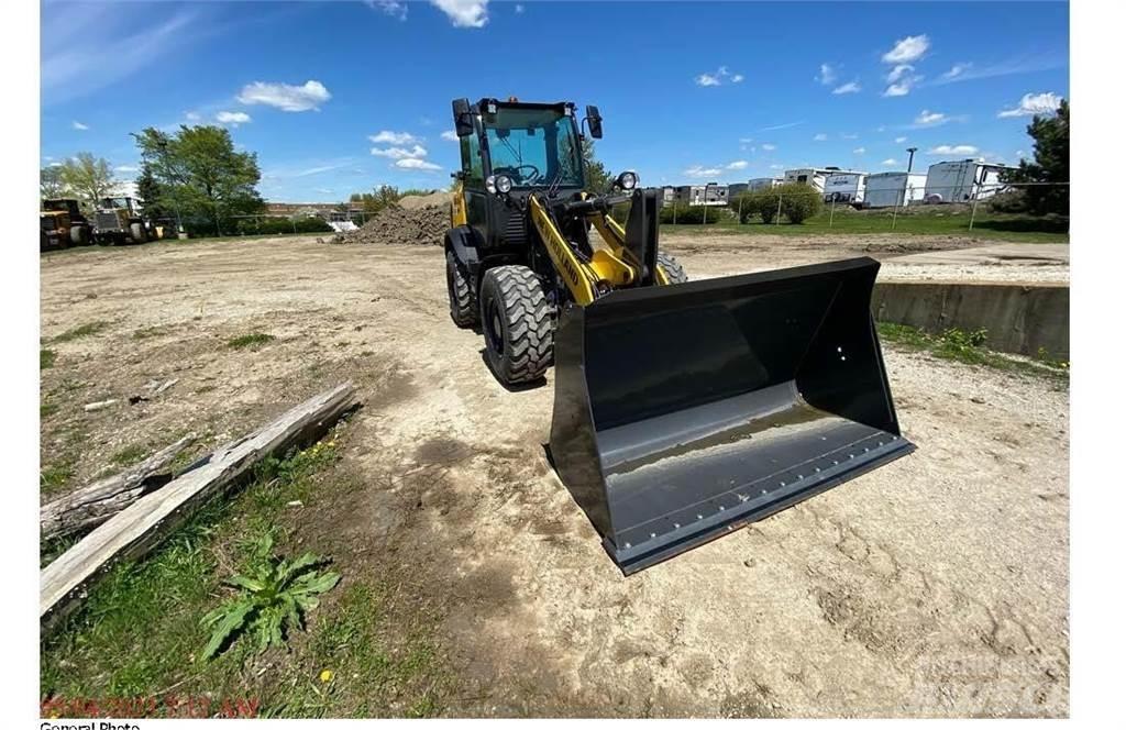 New Holland W80C Фронтальные погрузчики