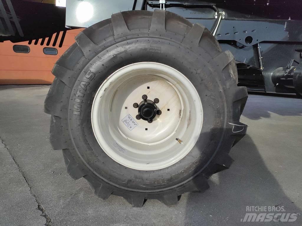 New Holland TC 5.90 Зерноуборочные комбайны