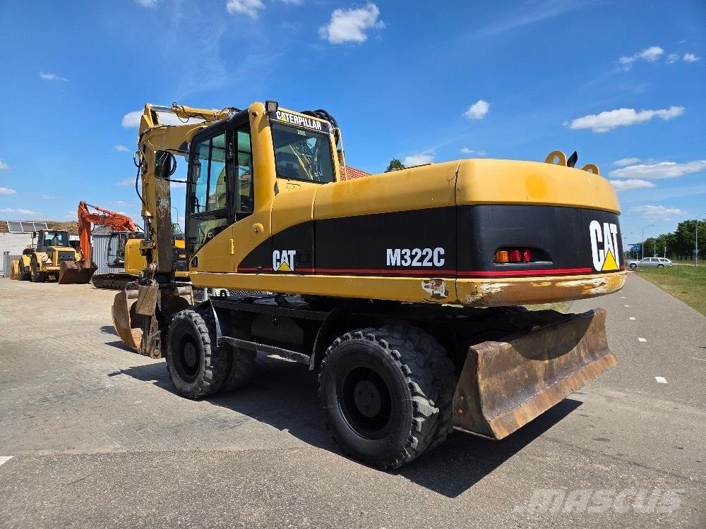 CAT M322C Колёсные экскаваторы