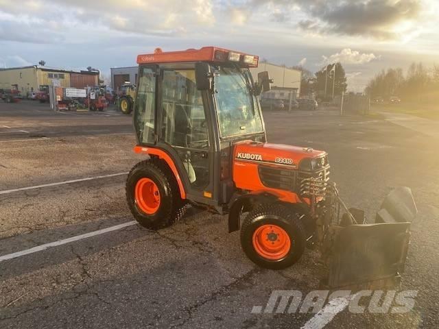 Kubota B 2410 Коммунальные тракторы