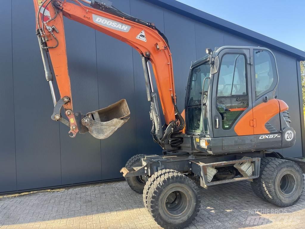 Doosan DX57W Колёсные экскаваторы