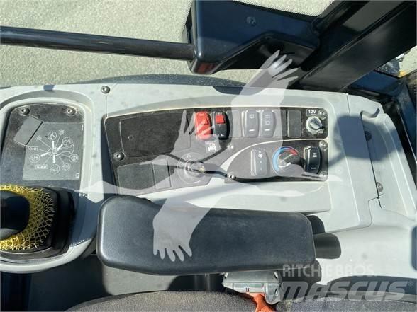 CAT 906M Фронтальные погрузчики