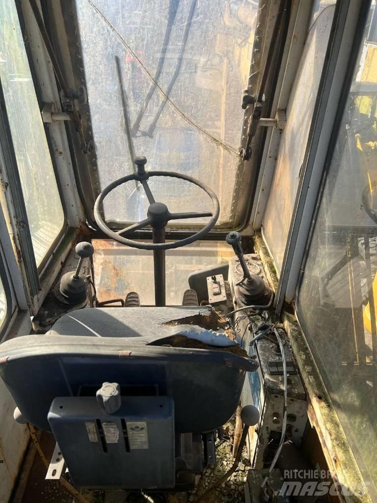 Liebherr 7951 Колёсные экскаваторы