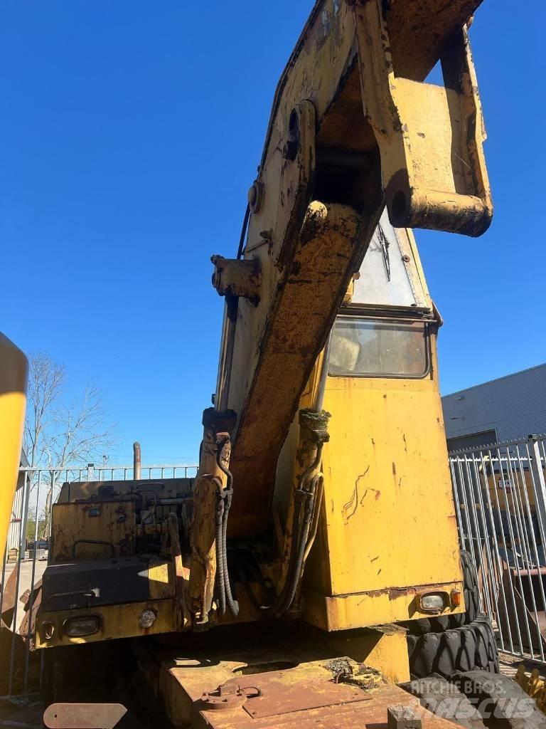 Liebherr 7951 Колёсные экскаваторы