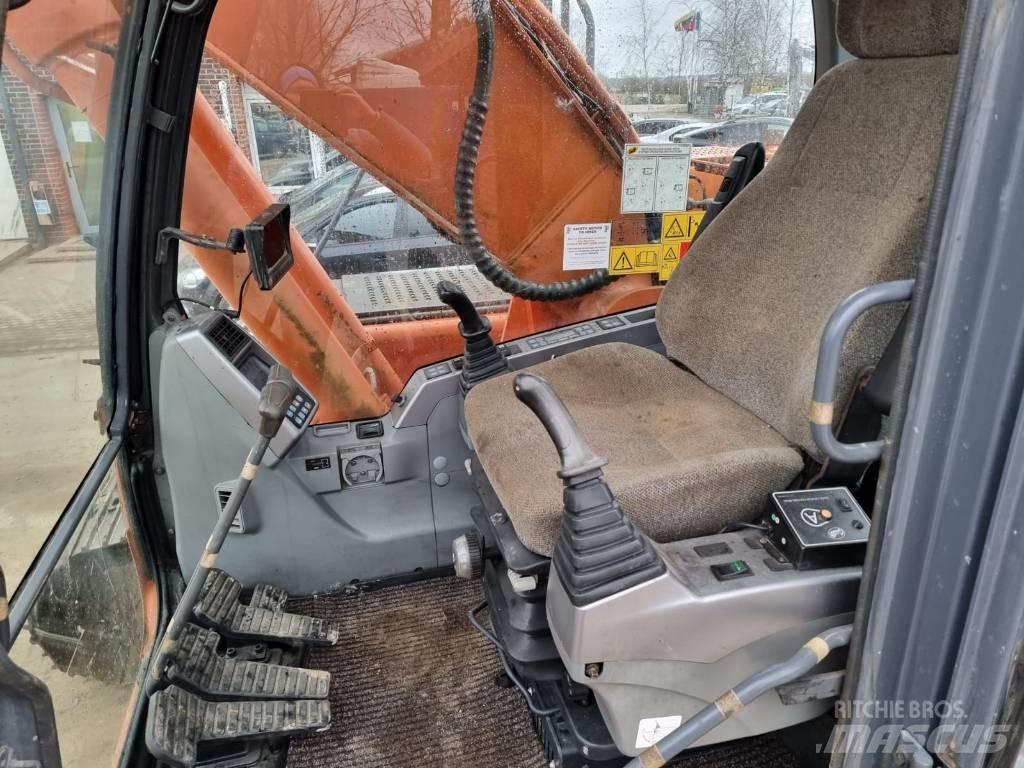 Doosan DX 225 LC Гусеничные экскаваторы