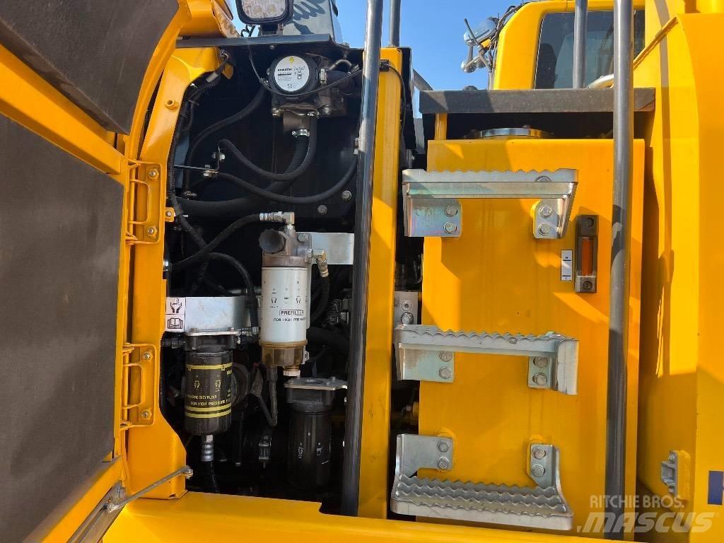 Komatsu PW 148-10 Колёсные экскаваторы