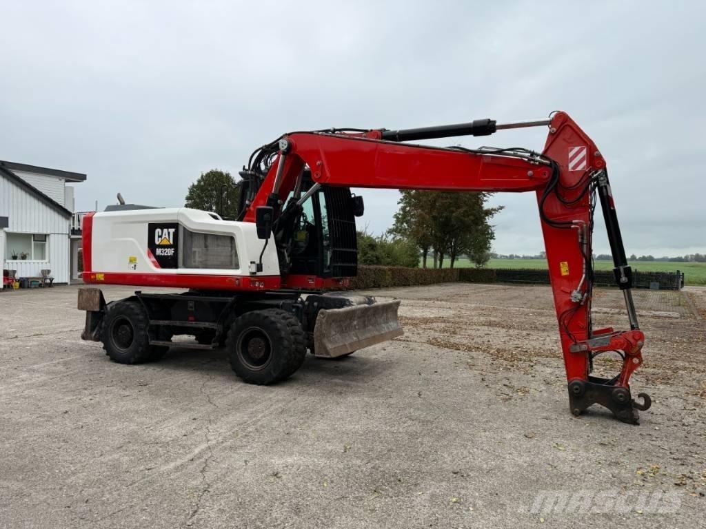 CAT M320F Колёсные экскаваторы