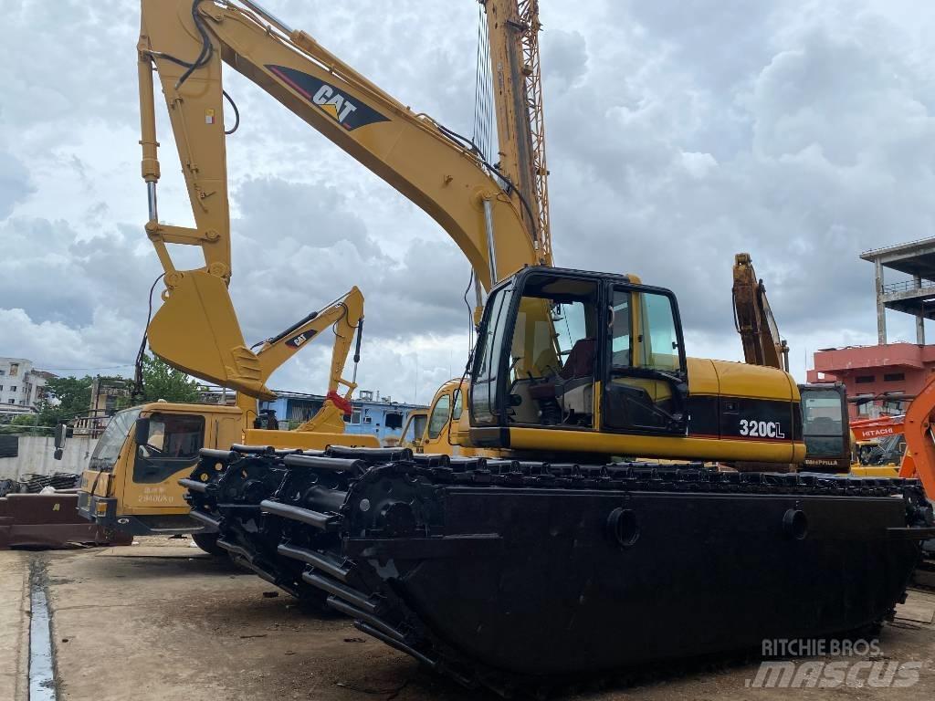 CAT 320 C Экскаваторы-амфибии