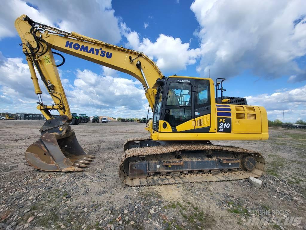 Komatsu PC210-11E0 Гусеничные экскаваторы