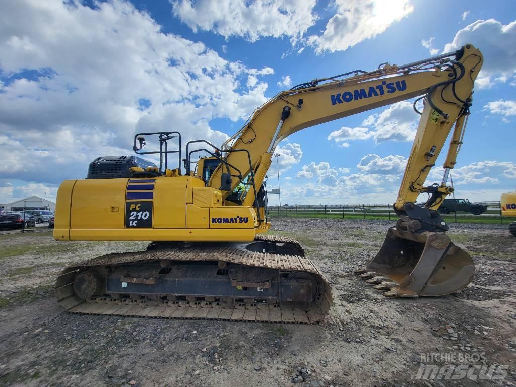 Komatsu PC210-11E0 Гусеничные экскаваторы
