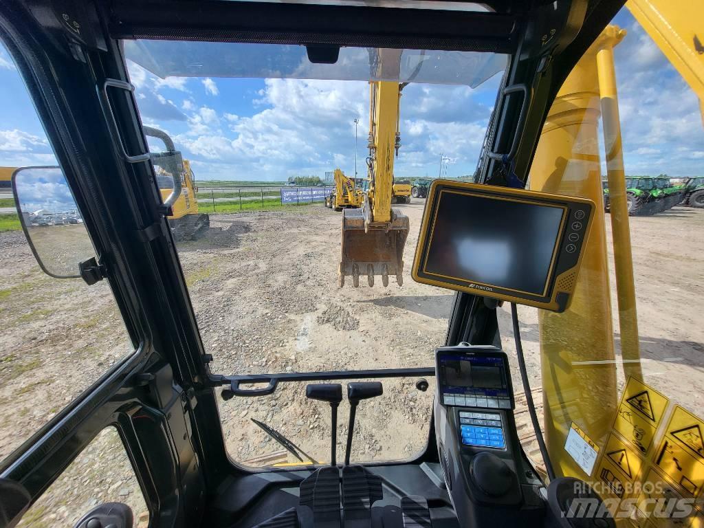Komatsu PC210-11E0 Гусеничные экскаваторы