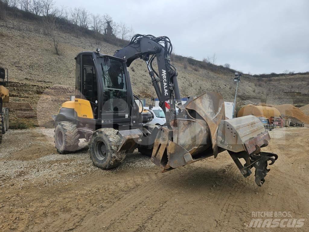 Mecalac 12 M TX Колёсные экскаваторы