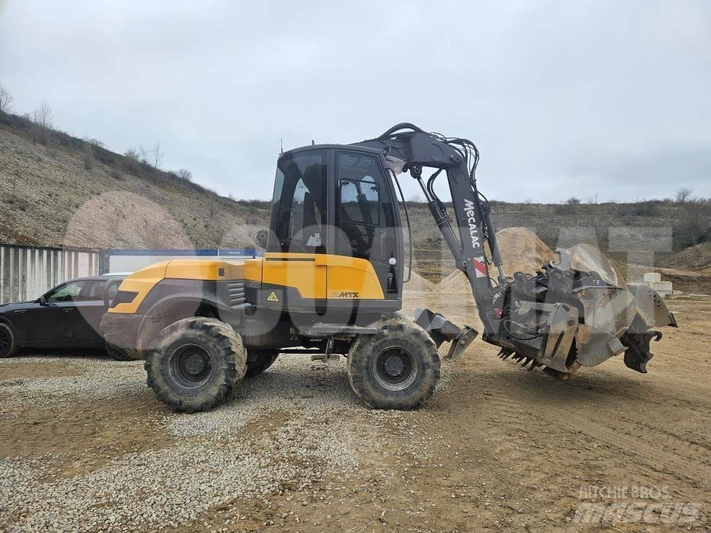 Mecalac 12 M TX Колёсные экскаваторы