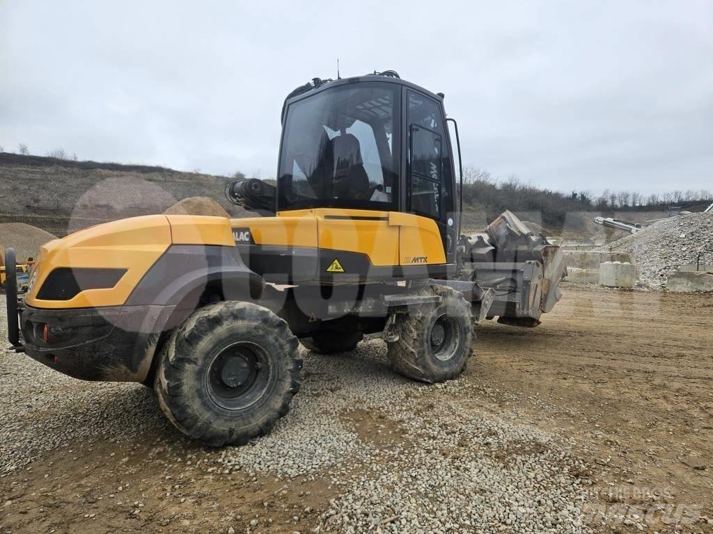 Mecalac 12 M TX Колёсные экскаваторы