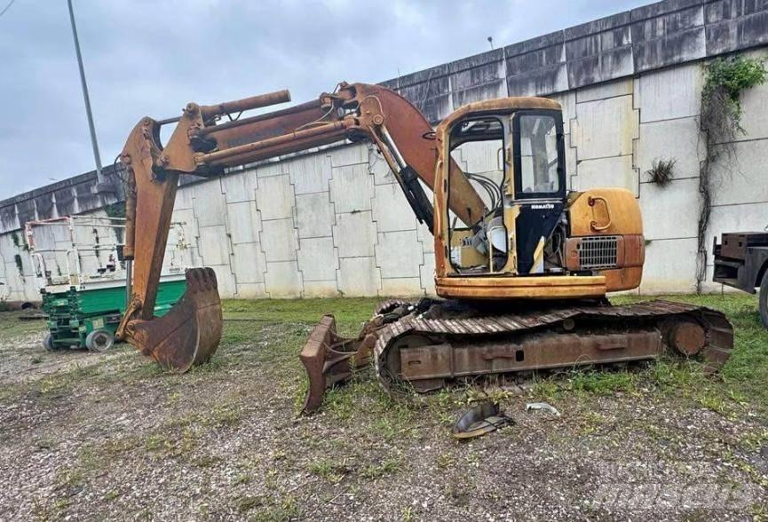 Komatsu PC 128 UU-1E Гусеничные экскаваторы