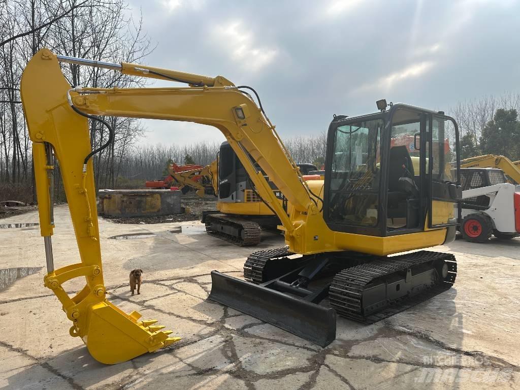 Komatsu PC56 Гусеничные экскаваторы