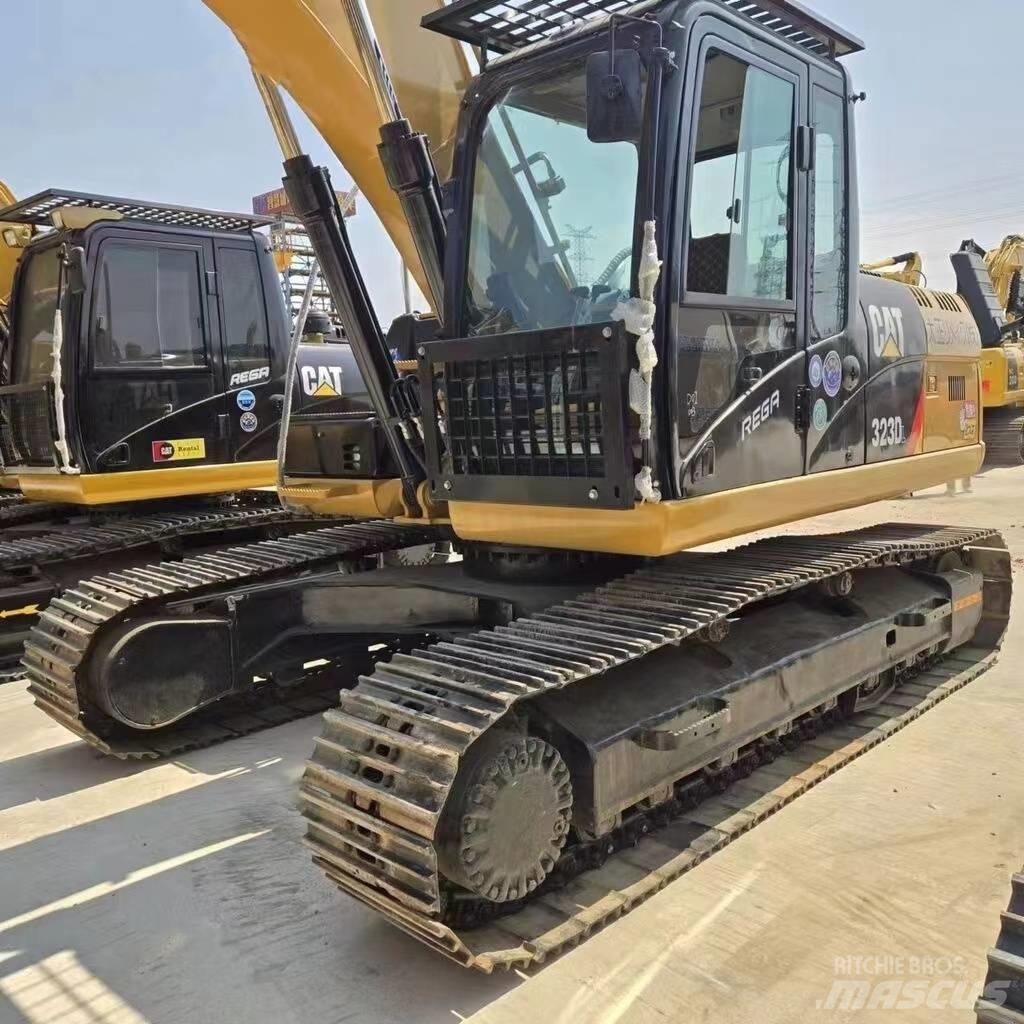 CAT 323 D Гусеничные экскаваторы