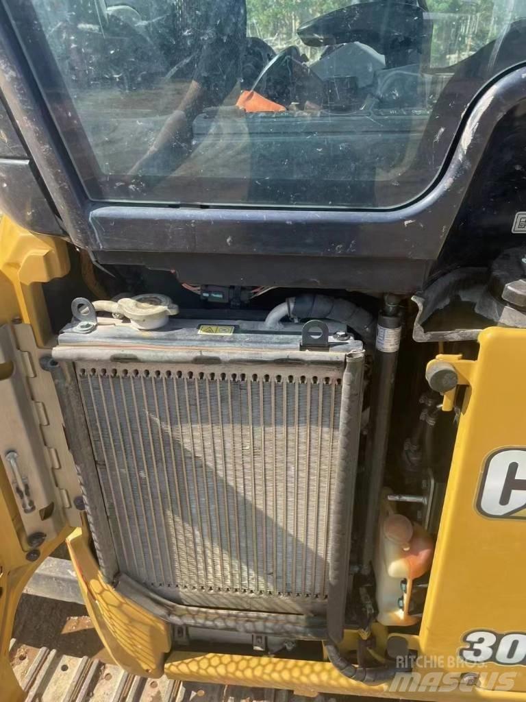 CAT 302 Мини-экскаваторы