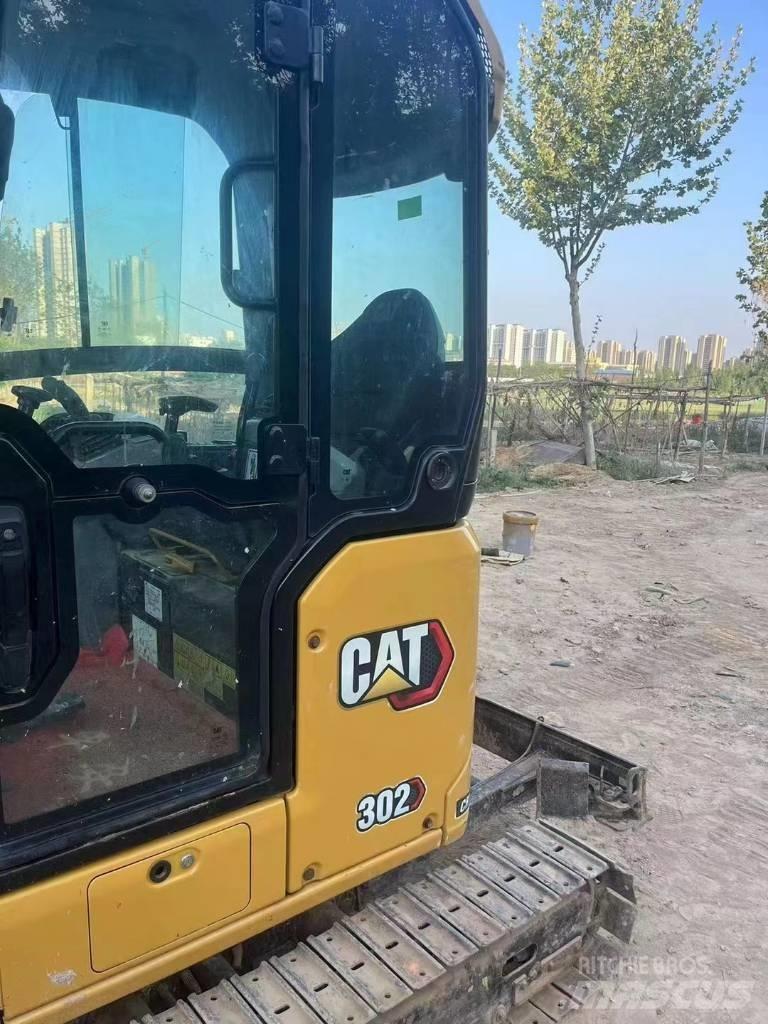 CAT 302 Мини-экскаваторы