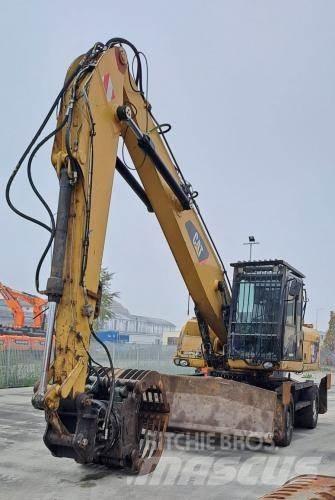 CAT M318D Строительная техника - Другие