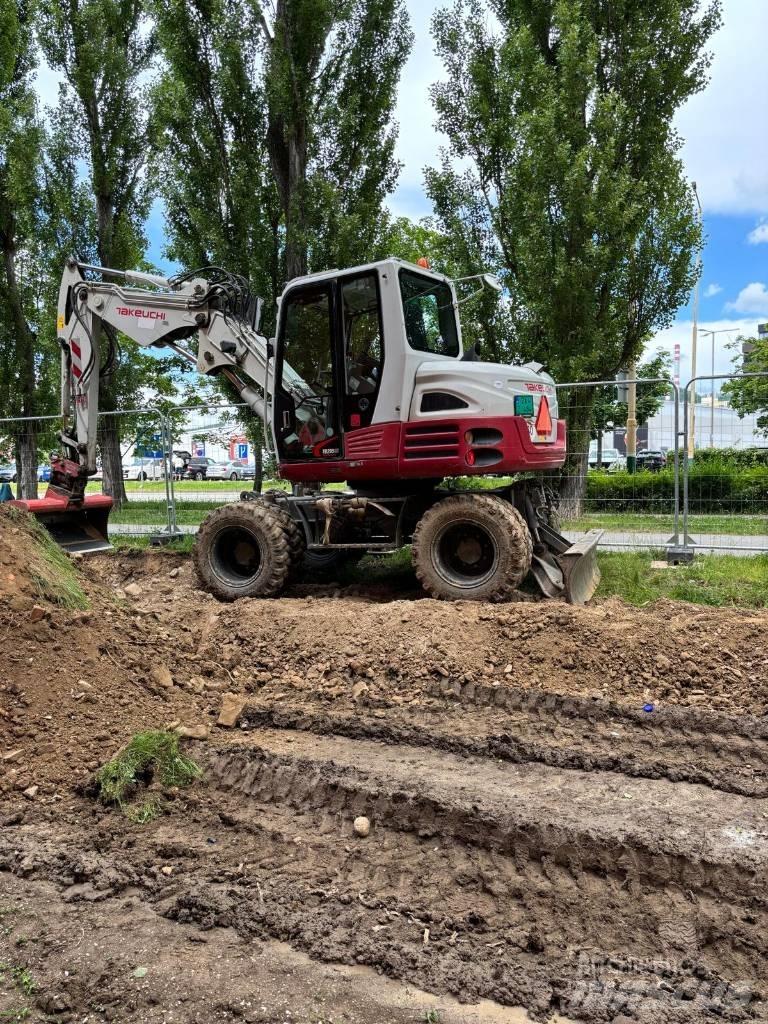 Takeuchi TB295W Колёсные экскаваторы
