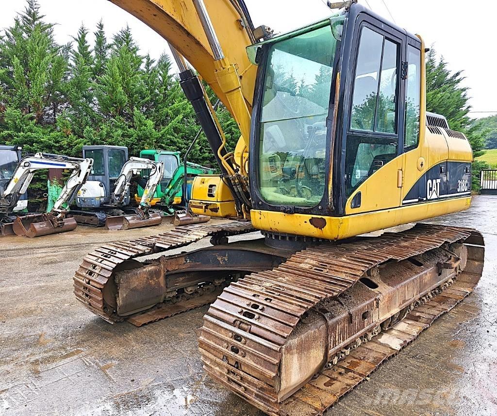 CAT 318 C Гусеничные экскаваторы