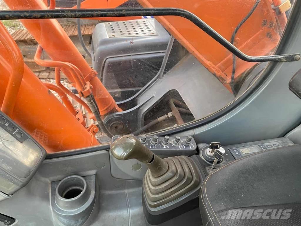 Hitachi ZX 210 Гусеничные экскаваторы