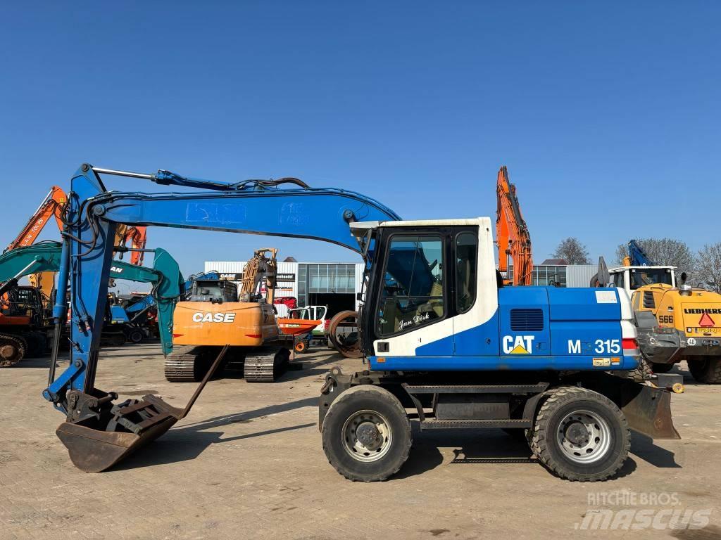 CAT M 315 Колёсные экскаваторы
