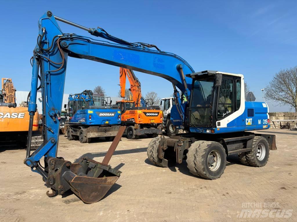 CAT M 315 Колёсные экскаваторы