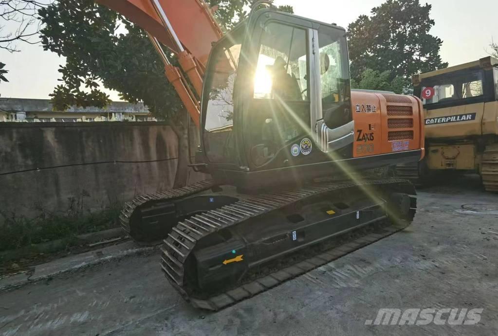 Hitachi ZX 200 Гусеничные экскаваторы