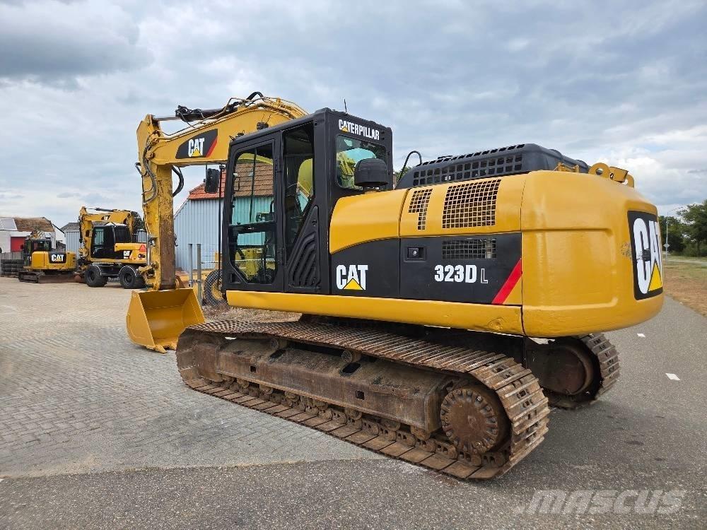 CAT 323DL Гусеничные экскаваторы