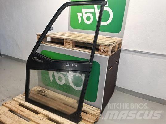 CAT TH407C door Кабины и интерьер