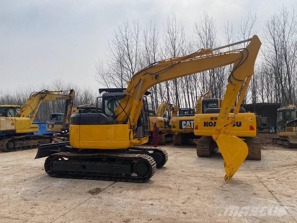 Komatsu PC128US Гусеничные экскаваторы