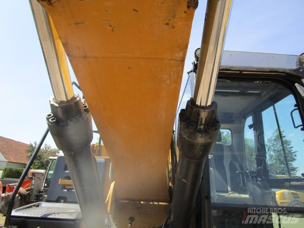 CAT 318 E L Гусеничные экскаваторы